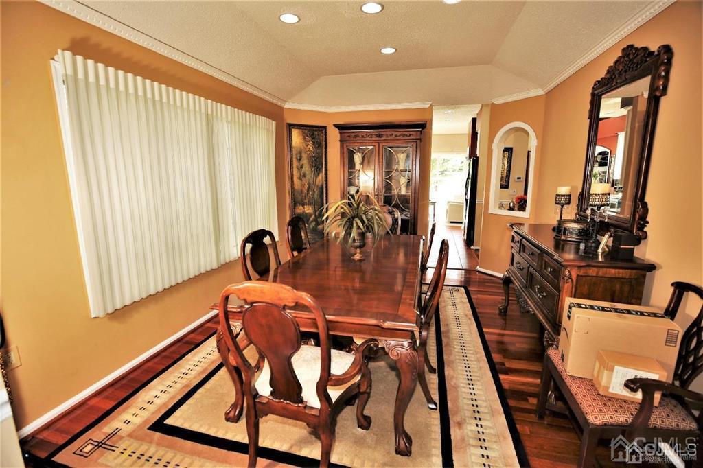 49 Harwood Road Monroe Township, NJ 08831 - Photo 11 of 73 a view of a dining room with furniture and window