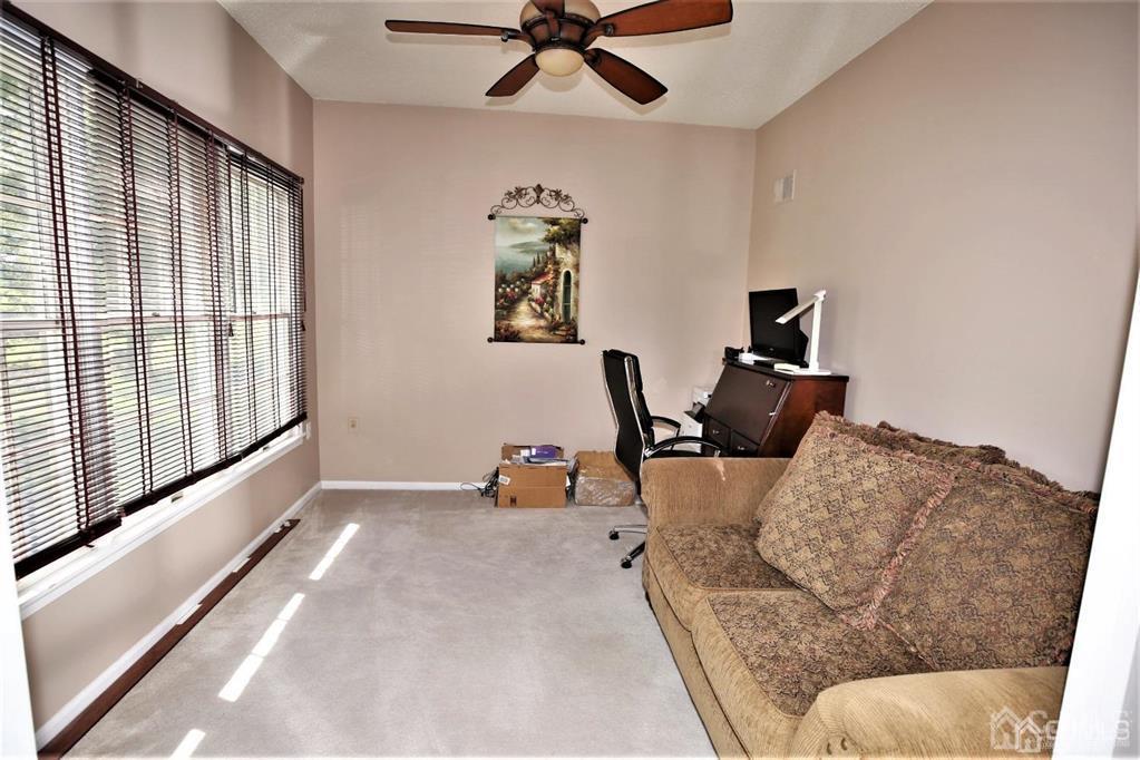 49 Harwood Road Monroe Township, NJ 08831 - Photo 21 of 73 a workspace with furniture and a window