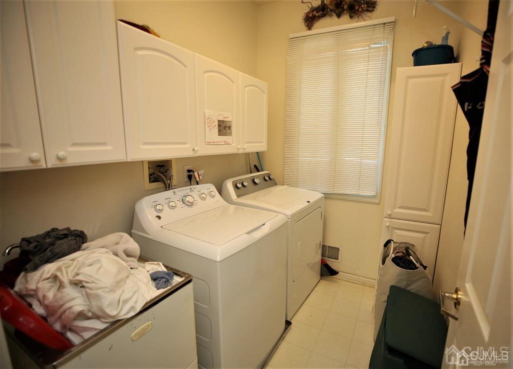 49 Harwood Road Monroe Township, NJ 08831 - Photo 34 of 73 a utility room with dryer and washer