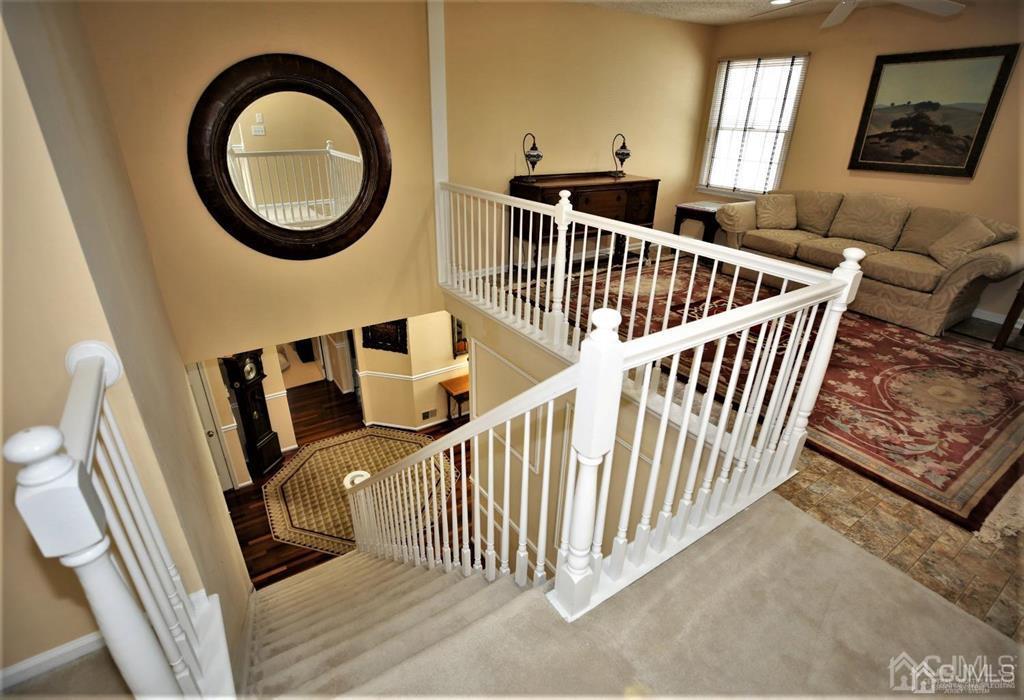 49 Harwood Road Monroe Township, NJ 08831 - Photo 35 of 73 a view of a porch with furniture and staircase