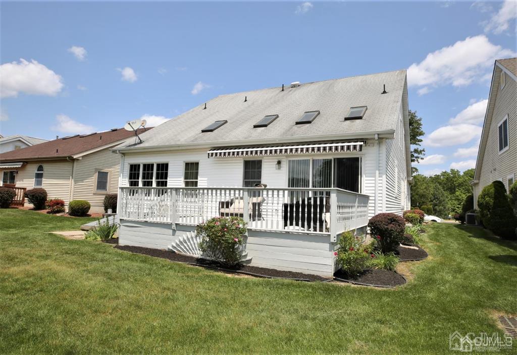 49 Harwood Road Monroe Township, NJ 08831 - Photo 61 of 73 a front view of a house with a yard