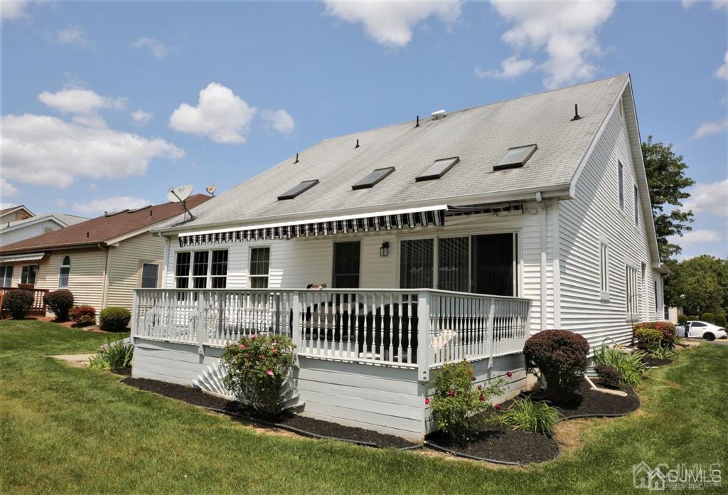 49 Harwood Road Monroe Township, NJ 08831 - Photo 73 of 73 a front view of a house with a yard