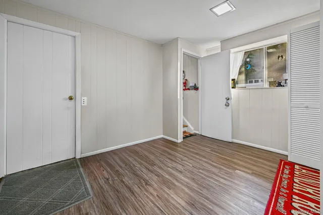a bathroom with a toilet a sink and shower