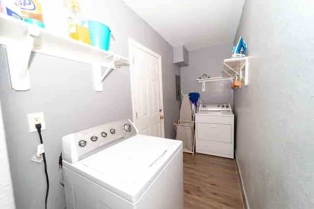 a utility room with dryer and washer