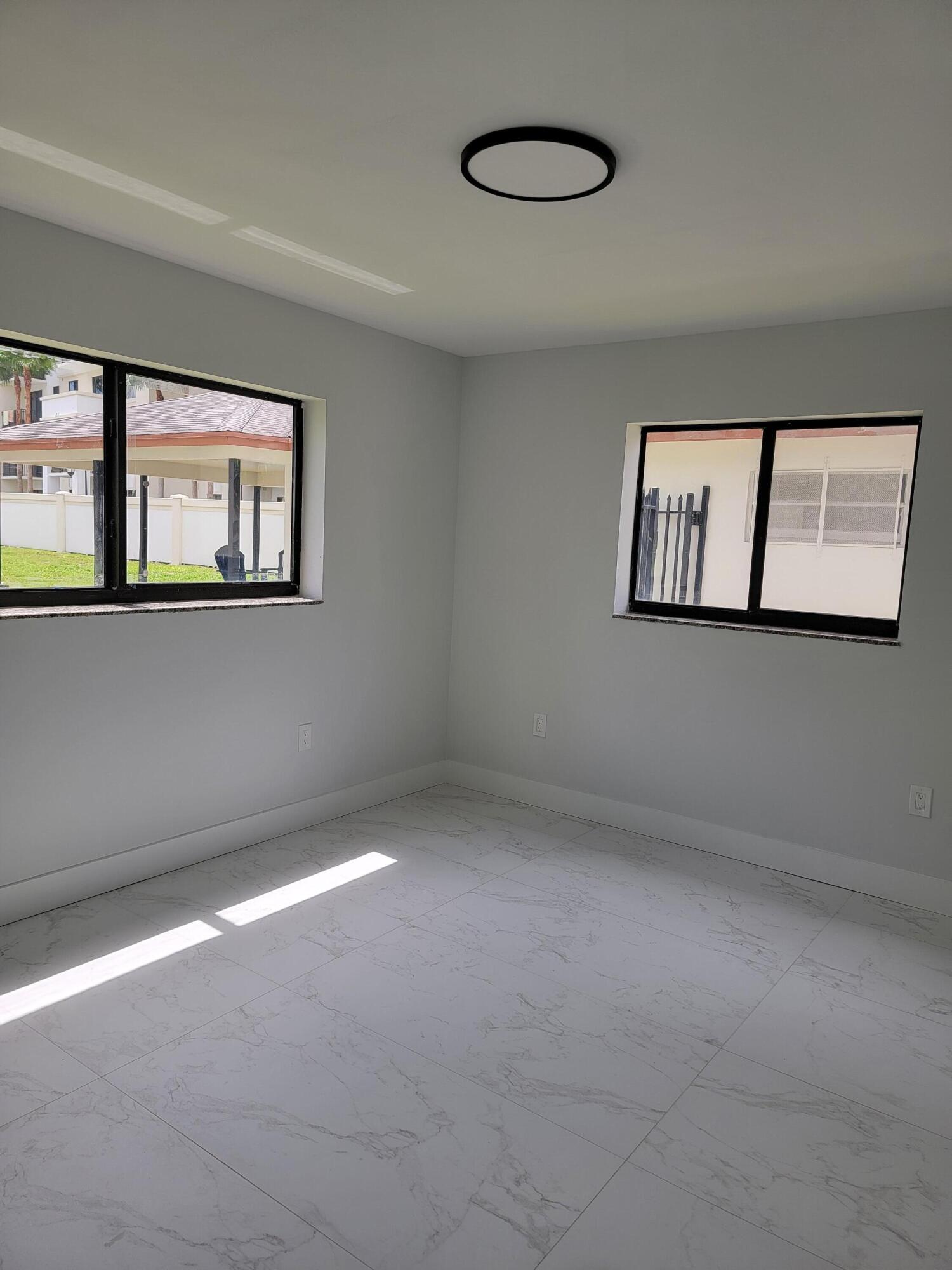 240 Southwest 7th Street, Unit 9 Boca Raton, FL 33432 - Photo 10 of 25 20260623_114155