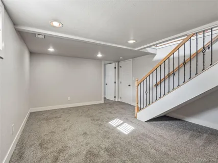 en view interior of a house with stairs and a window
