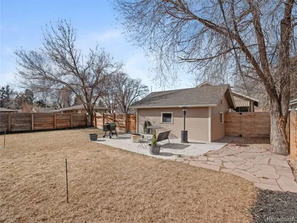 a house with trees in the background