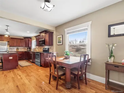 a view of a dining room with furniture