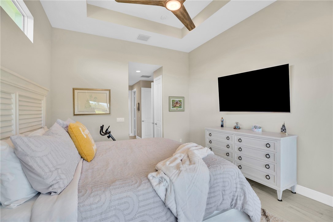 105 Night Hawk Way Sebastian, FL 32958 - Photo 20 of 36 a living room with furniture and a flat screen tv