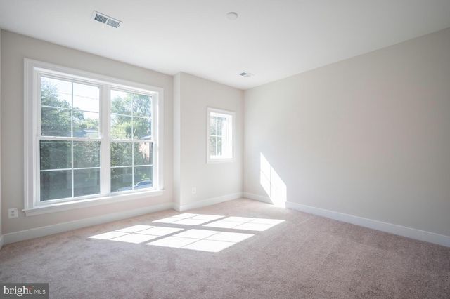 a view of empty room with a window