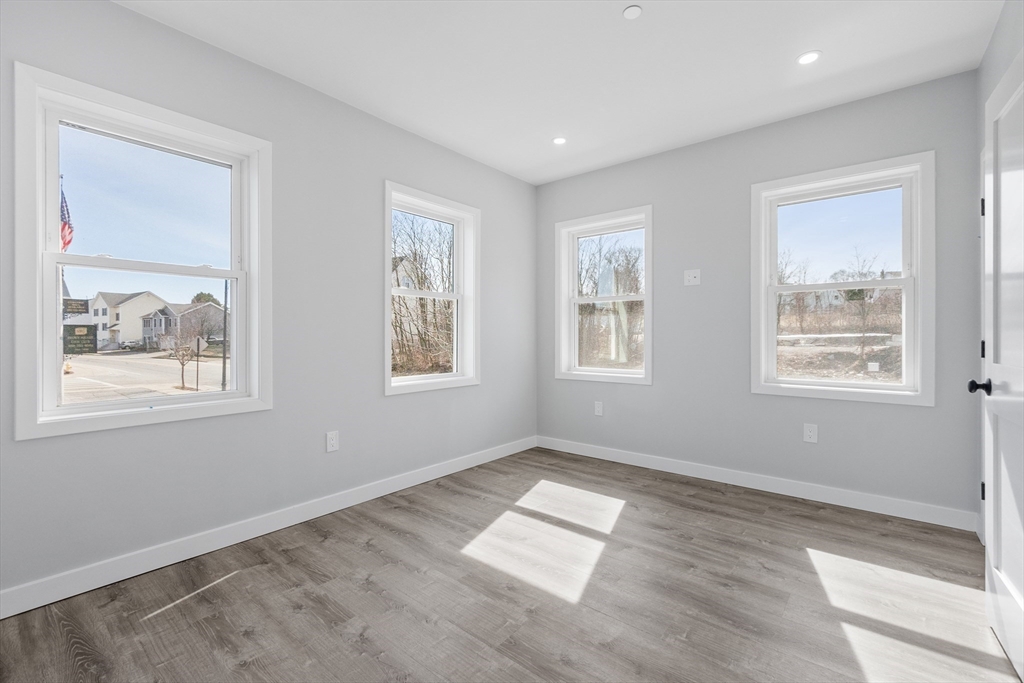 631 Franklin Street, Unit 209 Worcester, MA 01604 - Photo 16 of 42 a view of empty room with windows