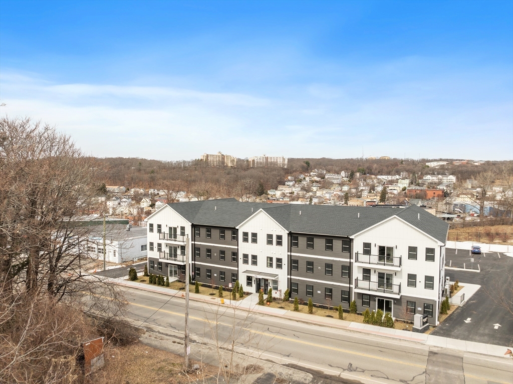 631 Franklin Street, Unit 209 Worcester, MA 01604 - Photo 28 of 42 a view of a city that has tall buildings