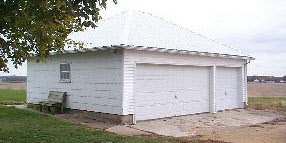 7621 West Midtown Road Mount Morris, IL 61054 - Photo 3 of 5 front view of a house with a dry yard