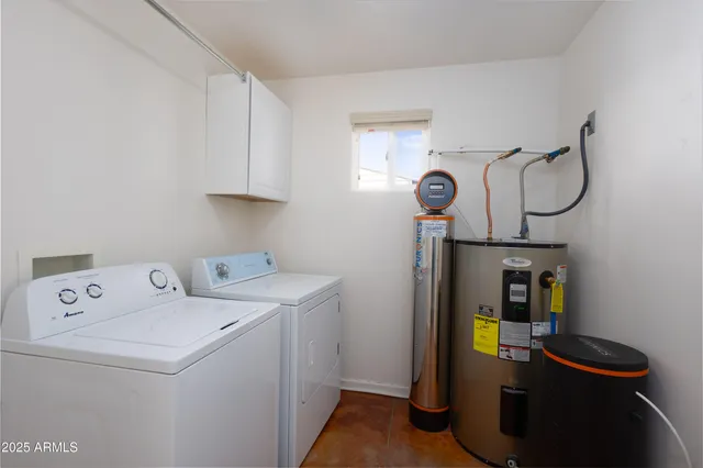 a building with potted plants in front of it