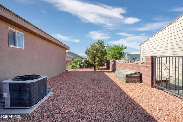 an outdoor space with lots of buildings in the background