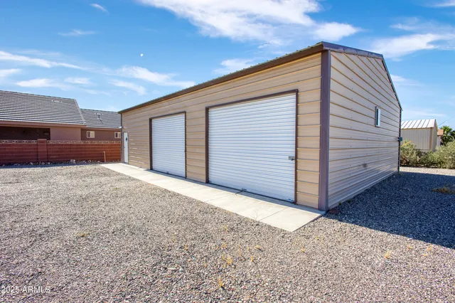 a view of a back yard of the house