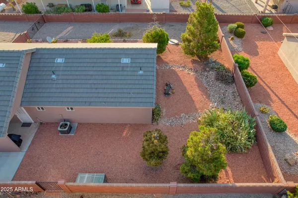 aerial view of a house with a ocean view
