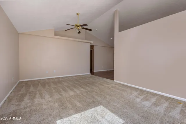 a kitchen with granite countertop a stove and a refrigerator