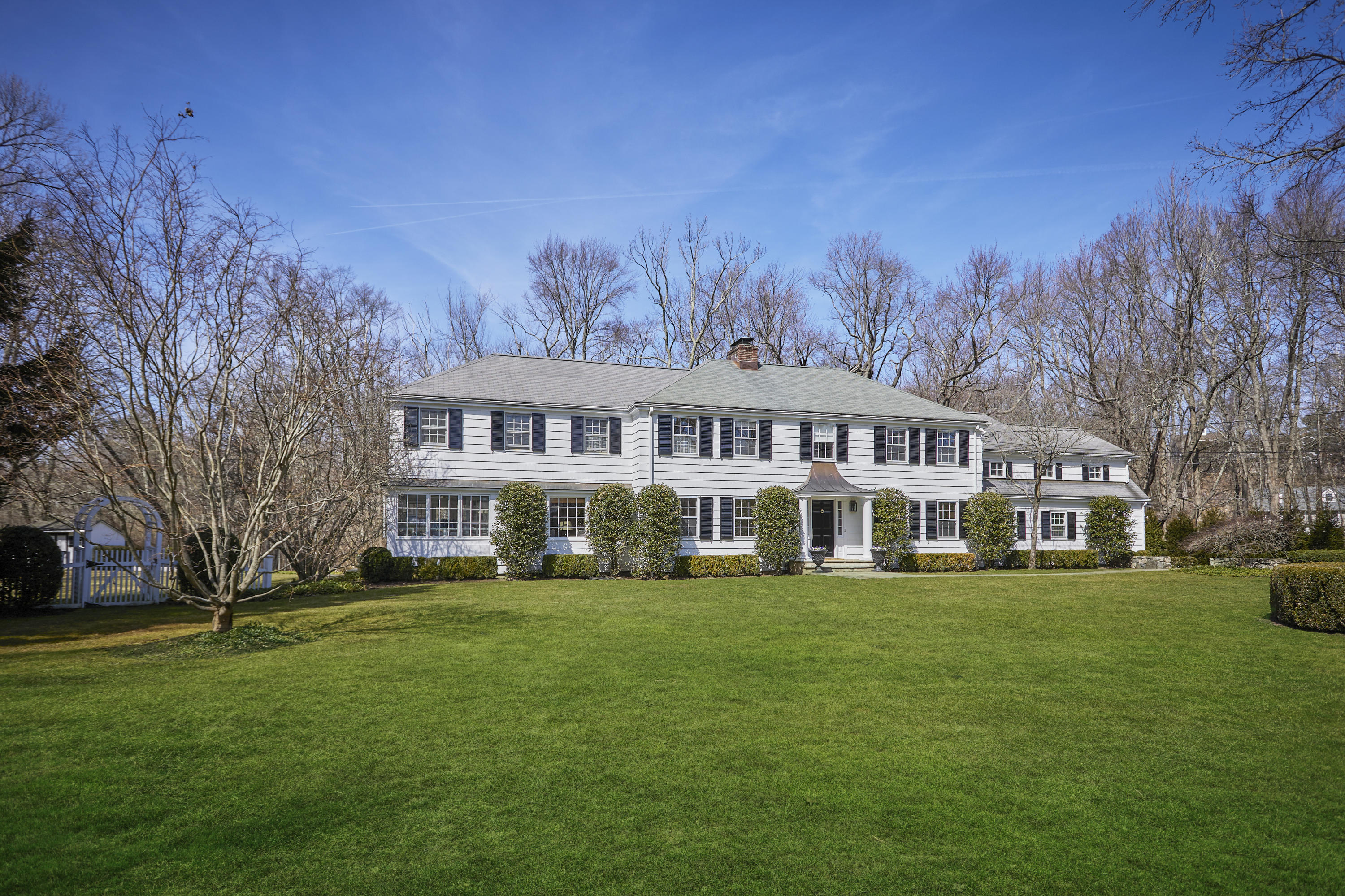 5 Driftway Lane Darien, CT 06820 - Photo 2 of 46 a view of a building with a yard