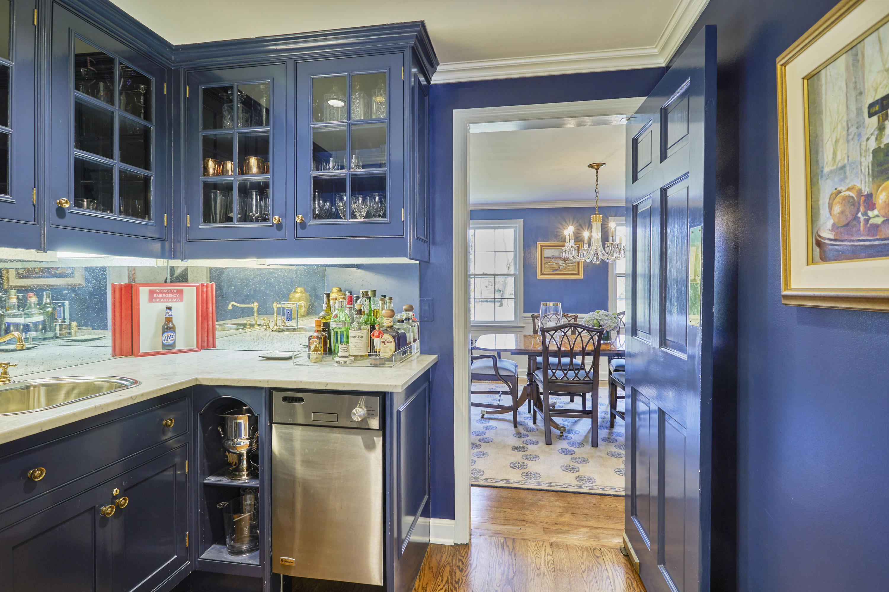 5 Driftway Lane Darien, CT 06820 - Photo 14 of 46 a view of a dining room with a table and chairs