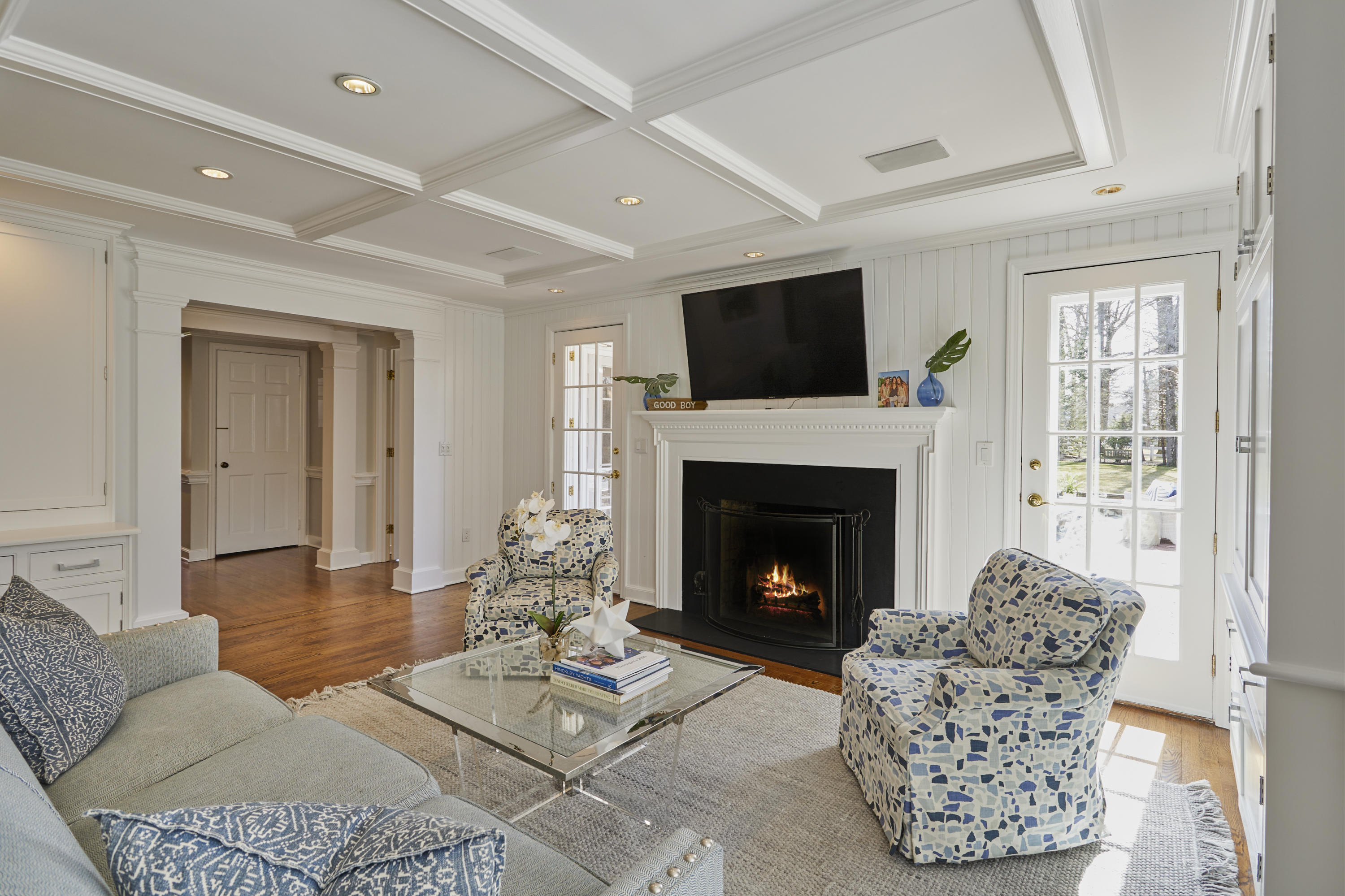 5 Driftway Lane Darien, CT 06820 - Photo 20 of 46 a living room with furniture a flat screen tv and a fireplace