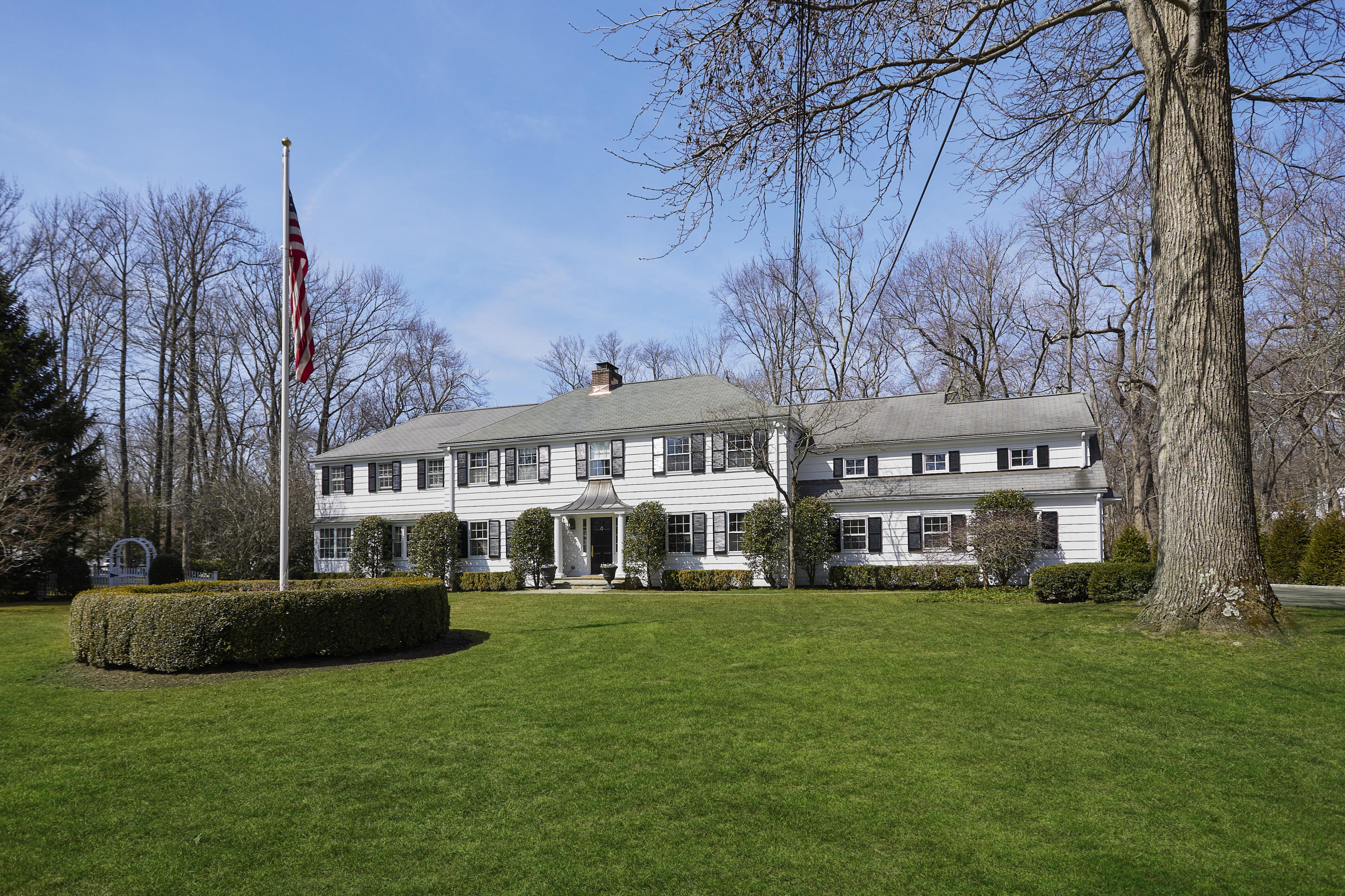 5 Driftway Lane Darien, CT 06820 - Photo 3 of 46 a view of house with a big yard and large trees