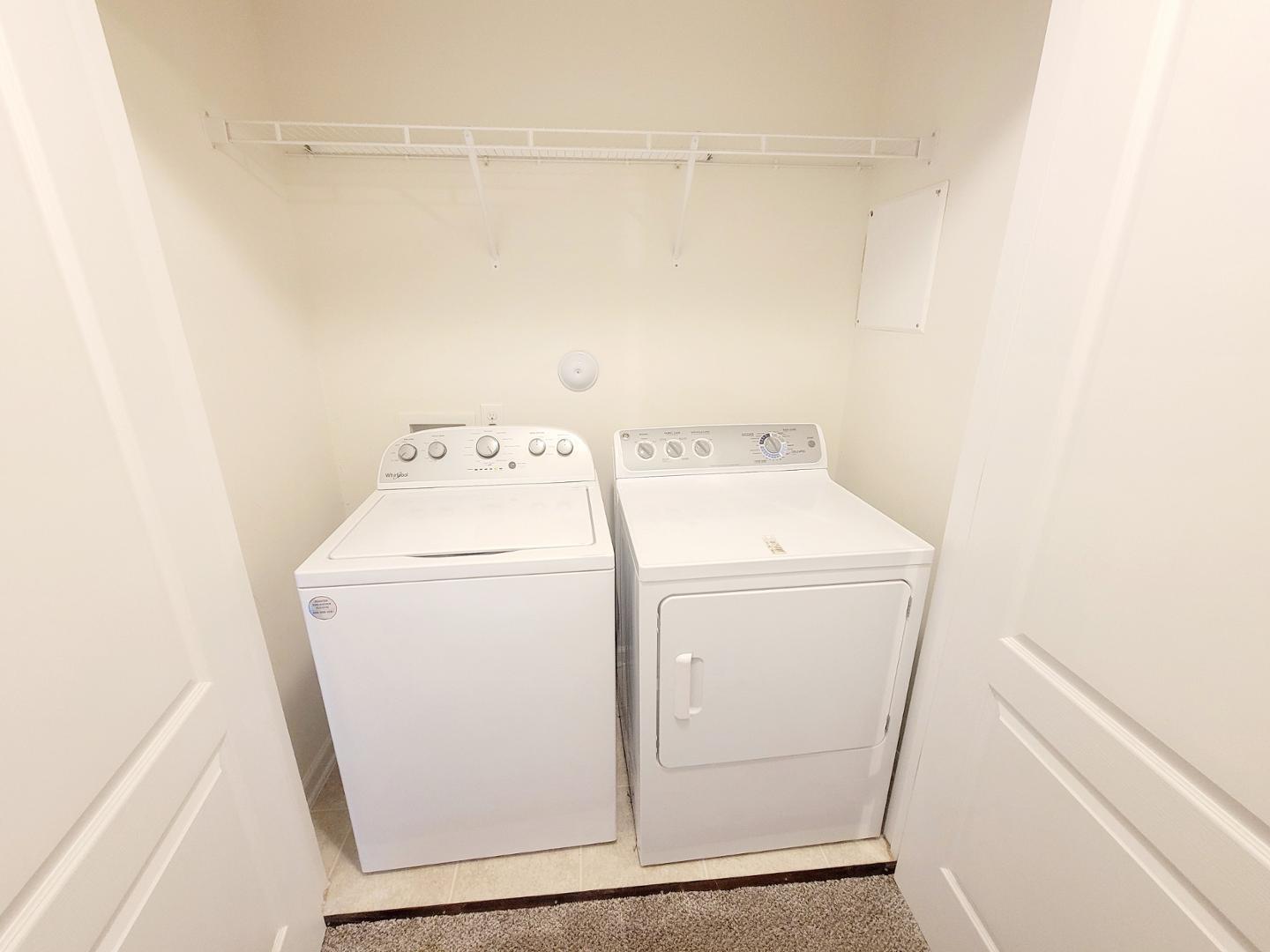 5423 Big Bass Drive Raleigh, NC 27610 - Photo 31 of 42 a utility room with dryer and washer