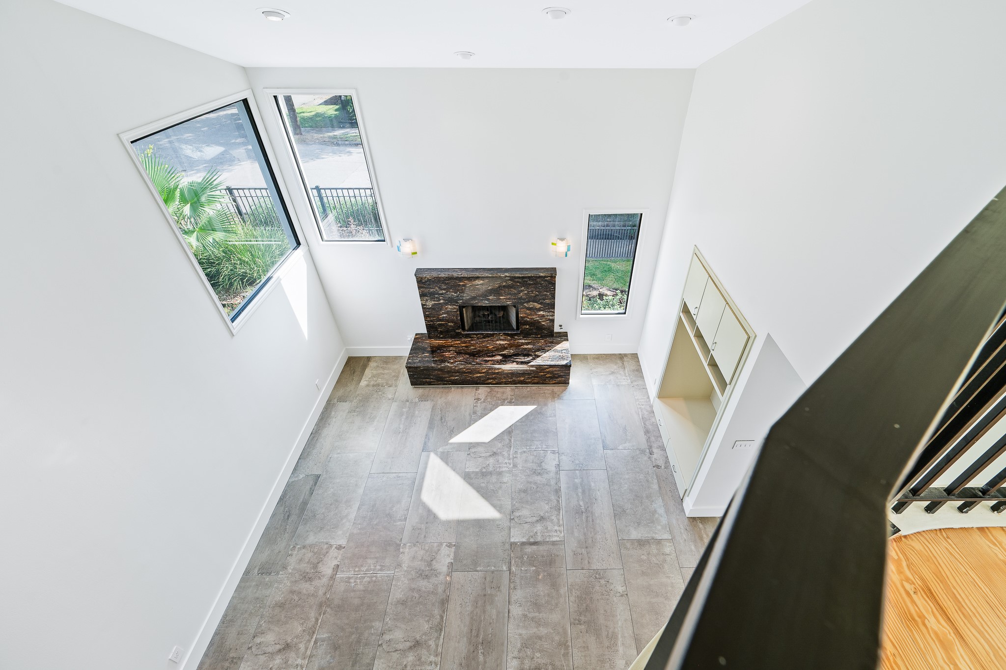 235 Malone Street Houston, TX 77007 - Photo 26 of 46 a living room with furniture and a fireplace