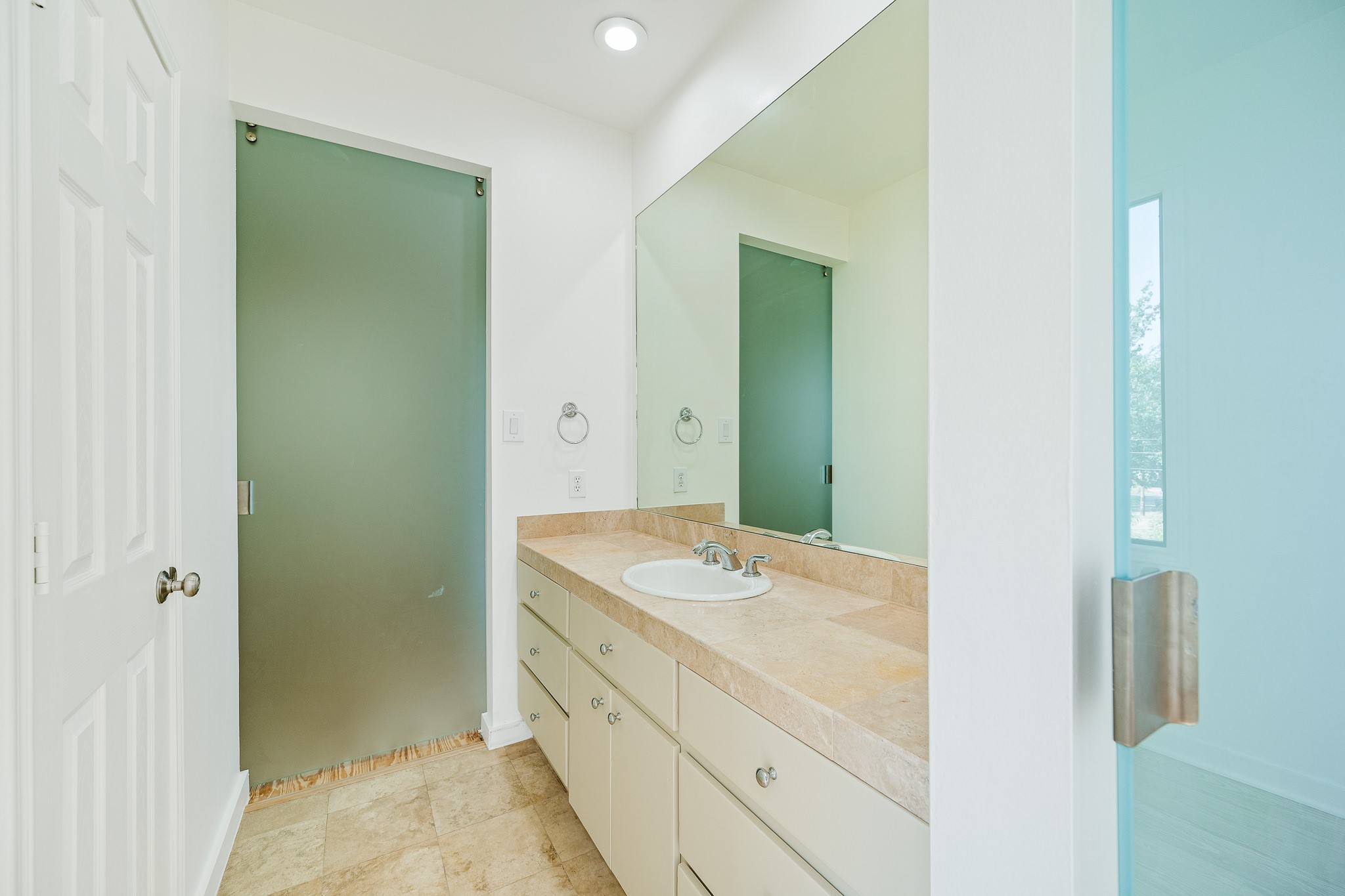 235 Malone Street Houston, TX 77007 - Photo 32 of 46 a bathroom with a granite countertop sink and mirror