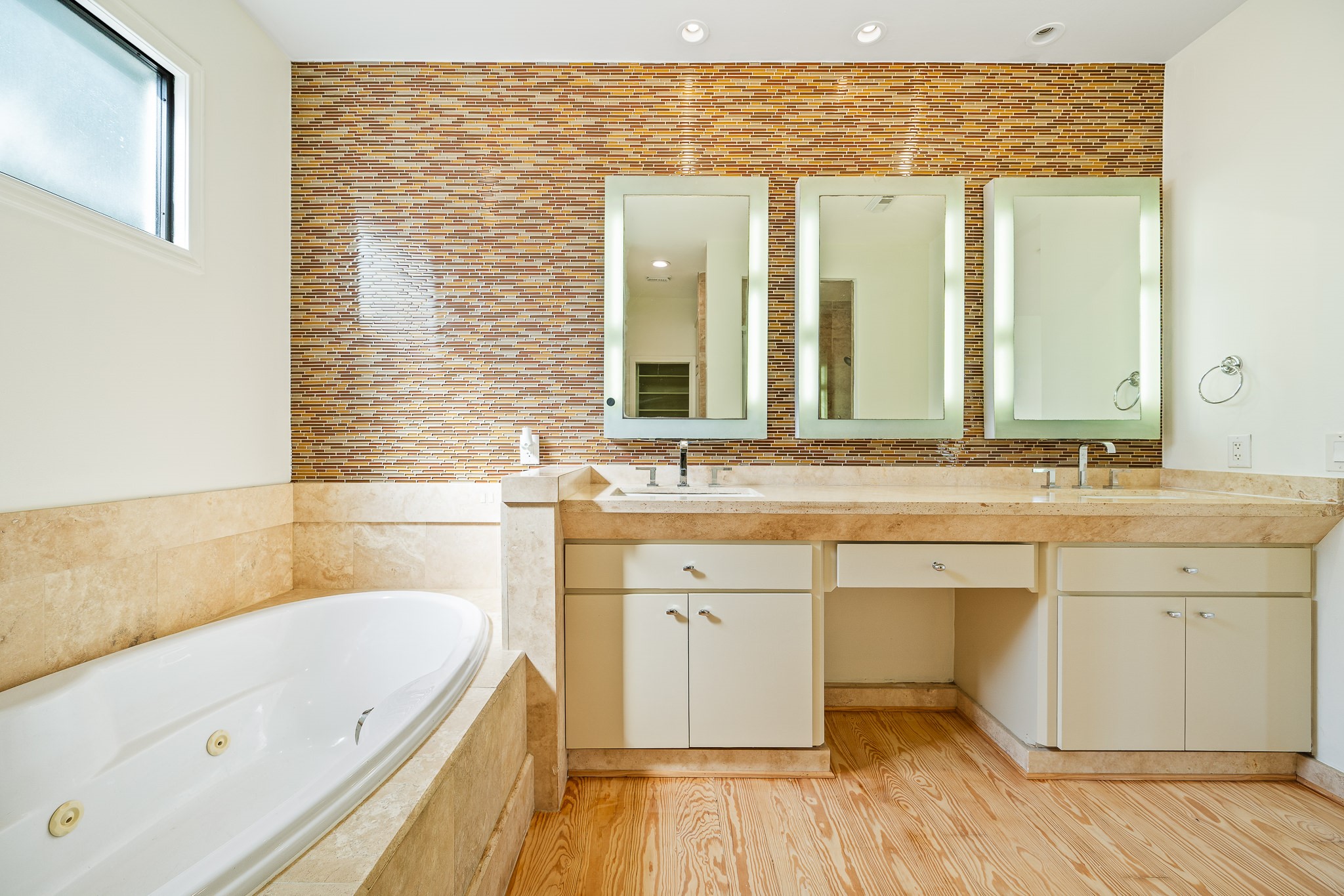 235 Malone Street Houston, TX 77007 - Photo 38 of 46 a bathroom with a double vanity sink mirror and bathtub