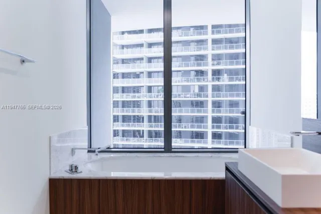 a view of a kitchen with a sink