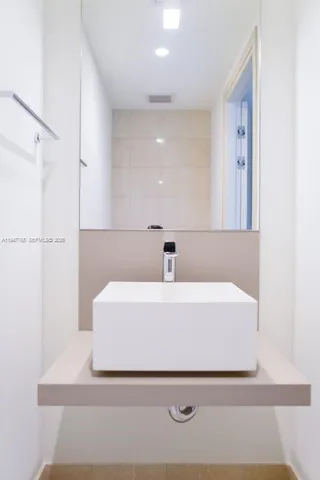 a bathroom with a white tub