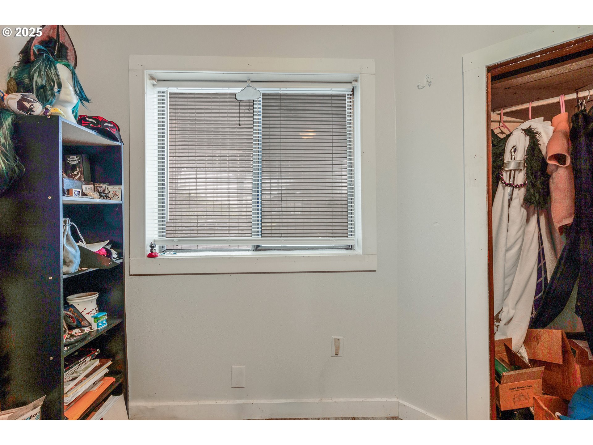 412 South 35th Street Springfield, OR 97478 - Photo 18 of 38 a view of walk in closet with clothes and shoes
