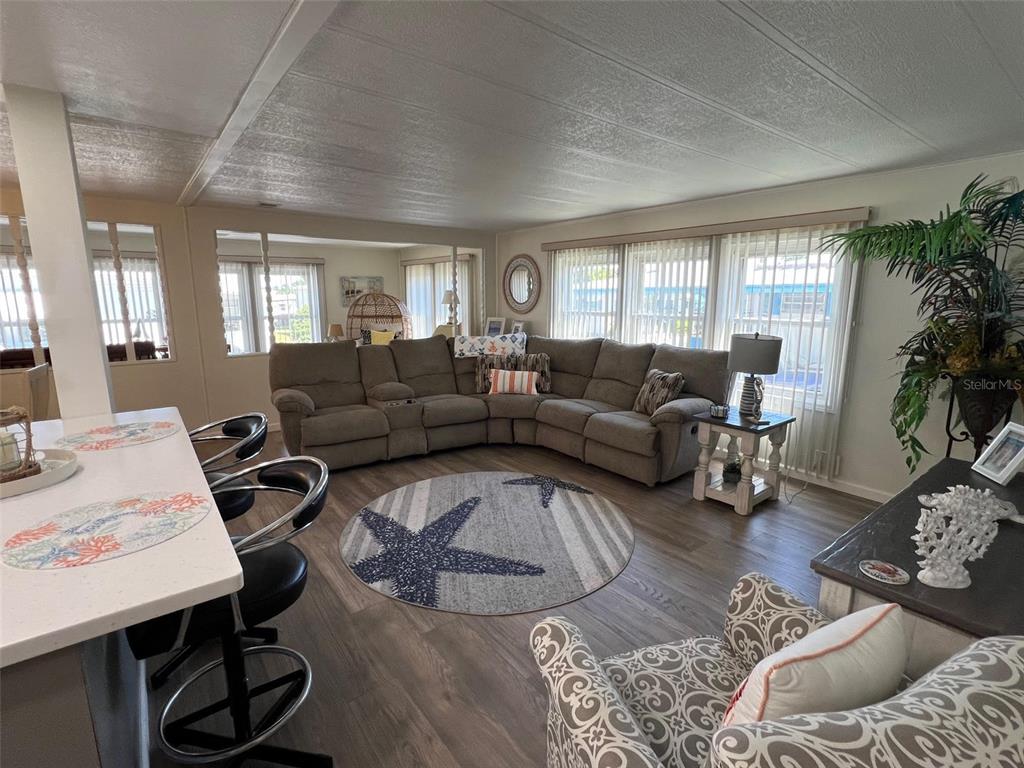 825 Coconut Palm Largo, FL 33778 - Photo 13 of 30 a living room with furniture and a large window