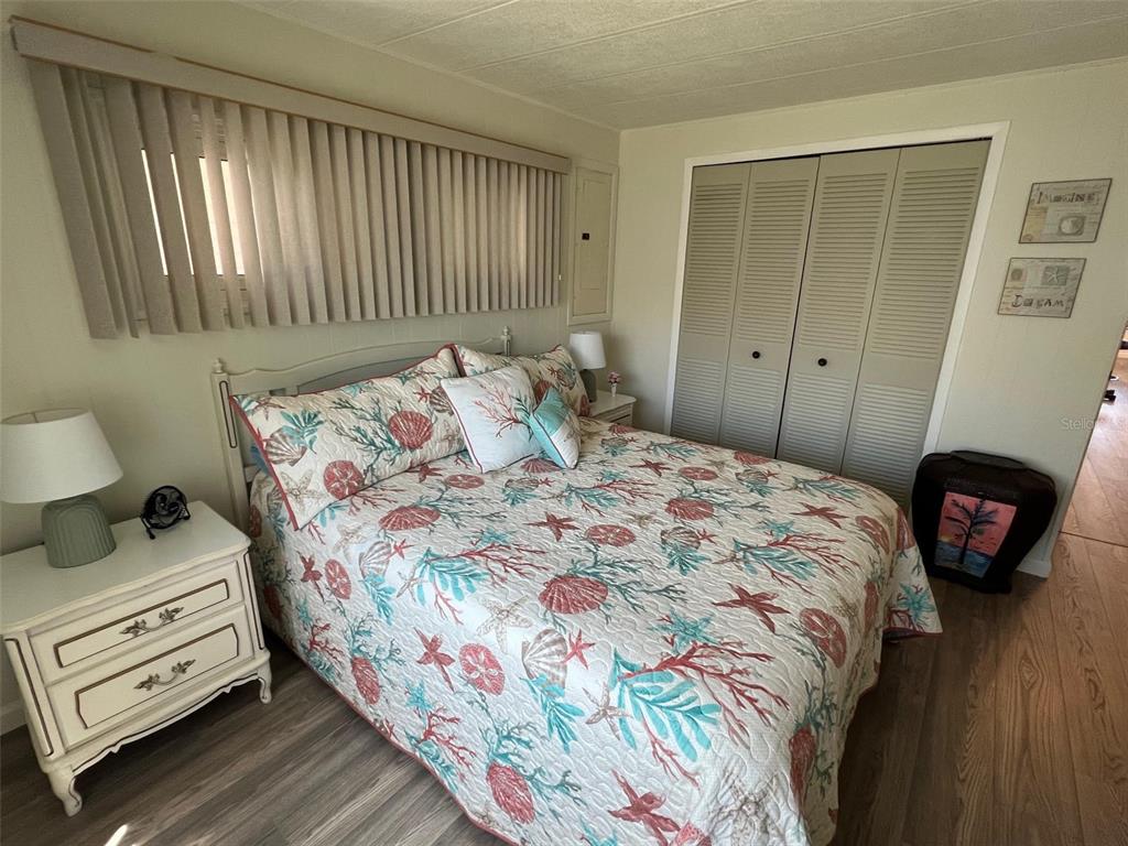825 Coconut Palm Largo, FL 33778 - Photo 24 of 30 a bedroom with a bed and a window