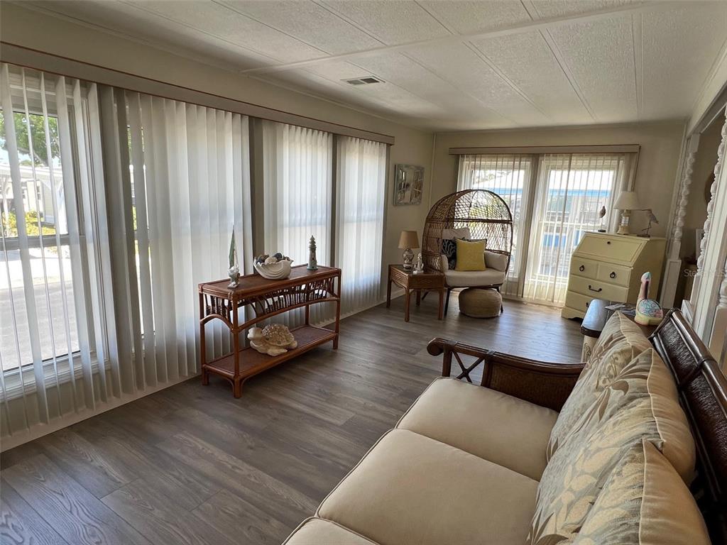 825 Coconut Palm Largo, FL 33778 - Photo 9 of 30 a living room with furniture and a large window