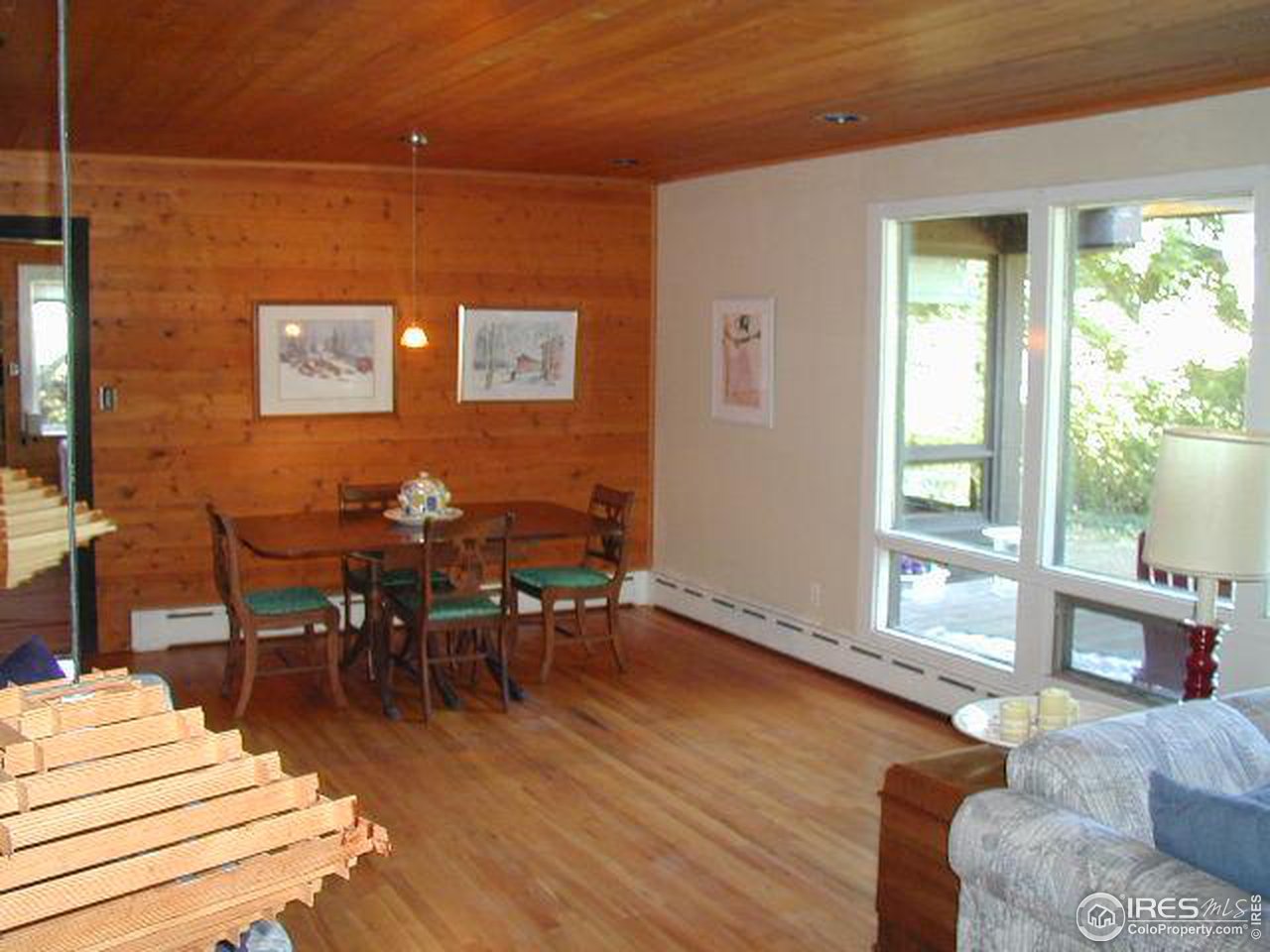 6239 Baseline Road Boulder, CO 80303 - Photo 6 of 13 a workspace with furniture window and wooden floor