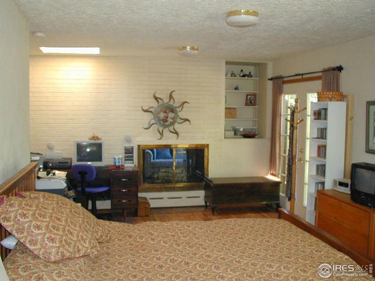 6239 Baseline Road Boulder, CO 80303 - Photo 8 of 13 a living room with furniture and a fireplace