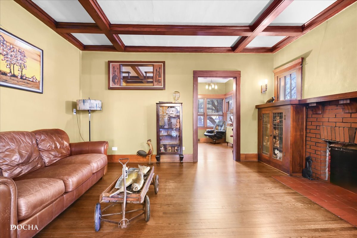 8725 Plattville Road Newark, IL 60541 - Photo 11 of 34 a living room with furniture and a flat screen tv
