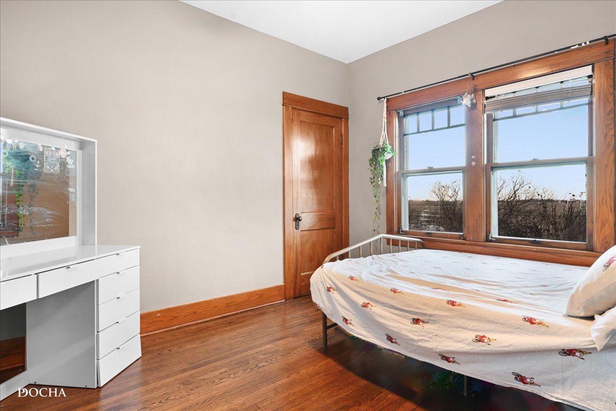 8725 Plattville Road Newark, IL 60541 - Photo 16 of 34 a bedroom with a bed and a window