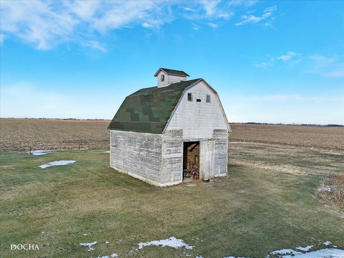 8725 Plattville Road Newark, IL 60541 - Photo 6 of 34 a view of a wooden floor and a building in the background