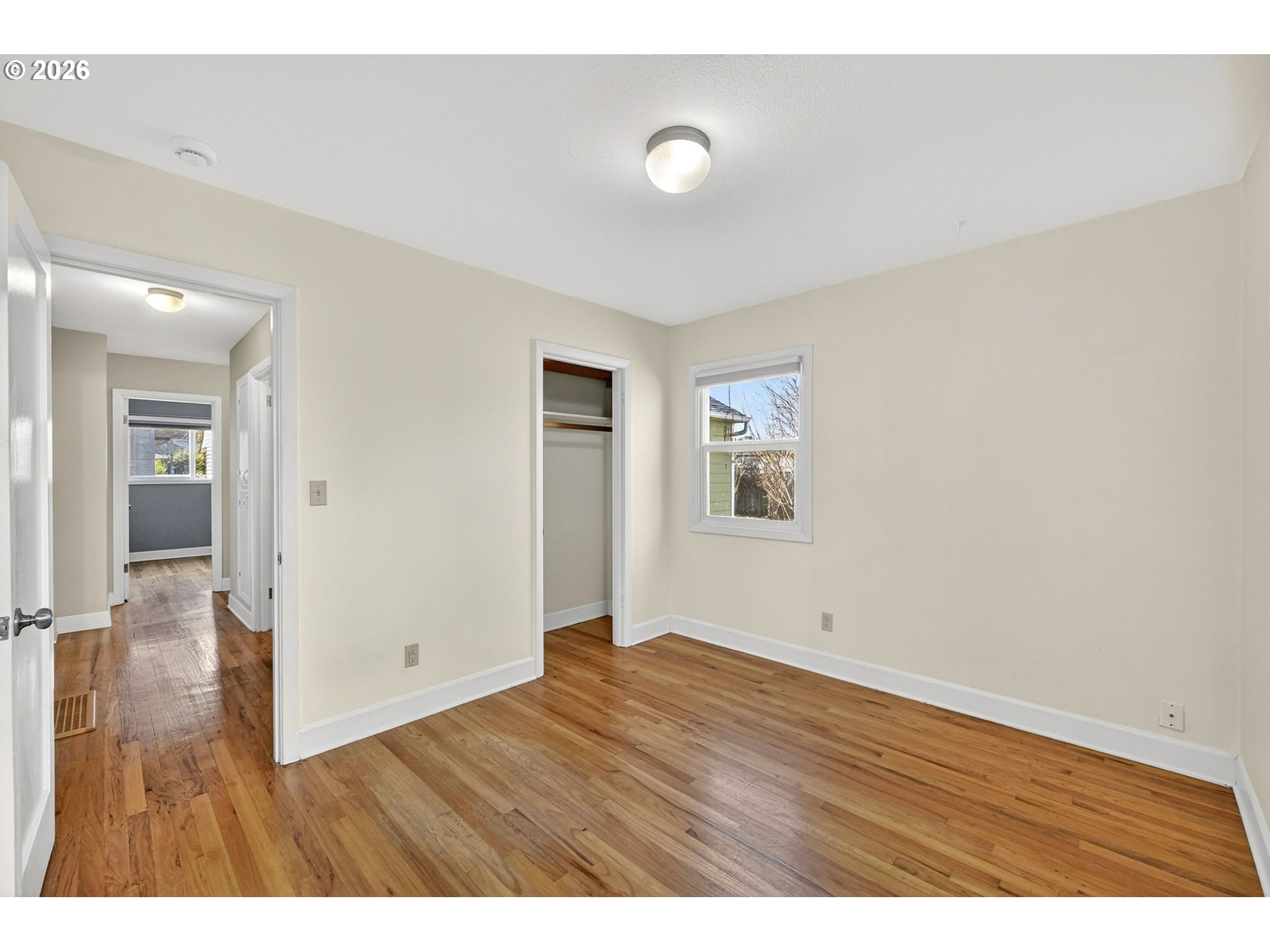 5617 Southeast 60th Avenue Portland, OR 97206 - Photo 20 of 34 a view of an empty room and wooden floor