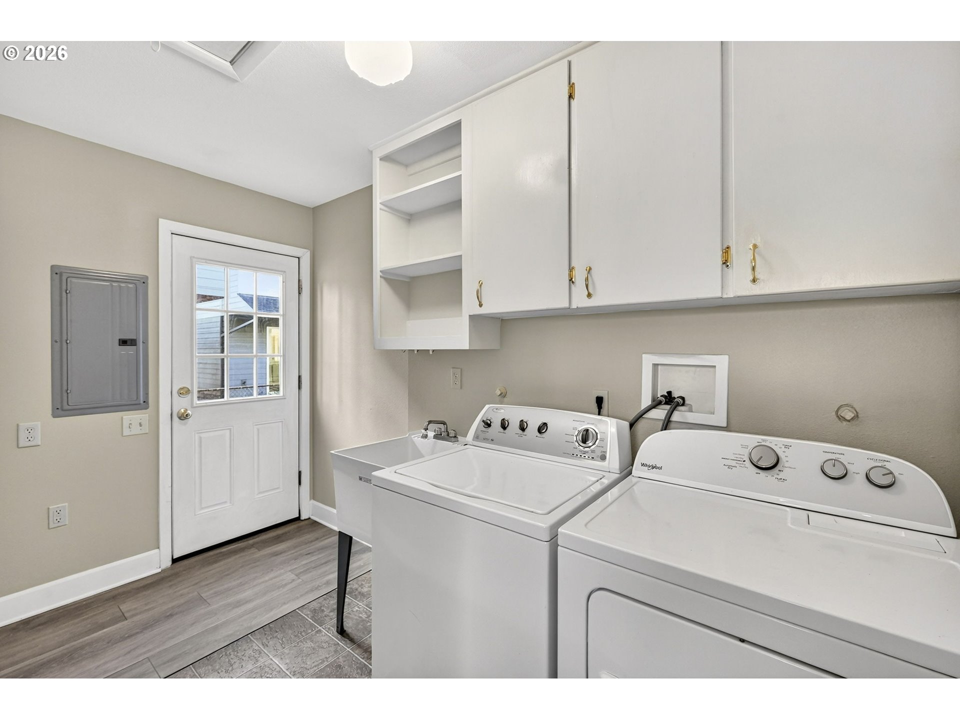 5617 Southeast 60th Avenue Portland, OR 97206 - Photo 24 of 34 a utility room with dryer and washer