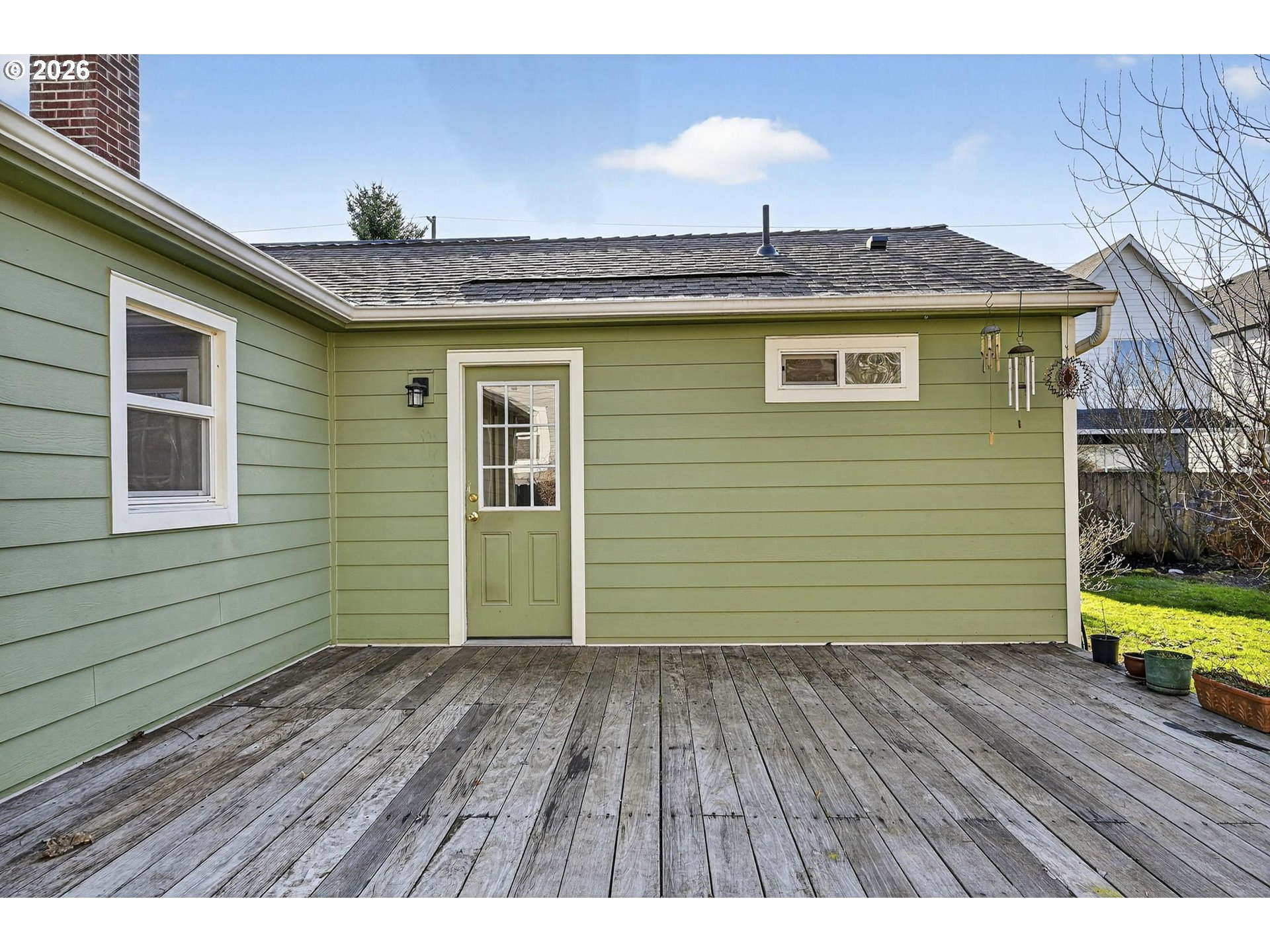 5617 Southeast 60th Avenue Portland, OR 97206 - Photo 27 of 34 a view of backyard with deck and wooden floor