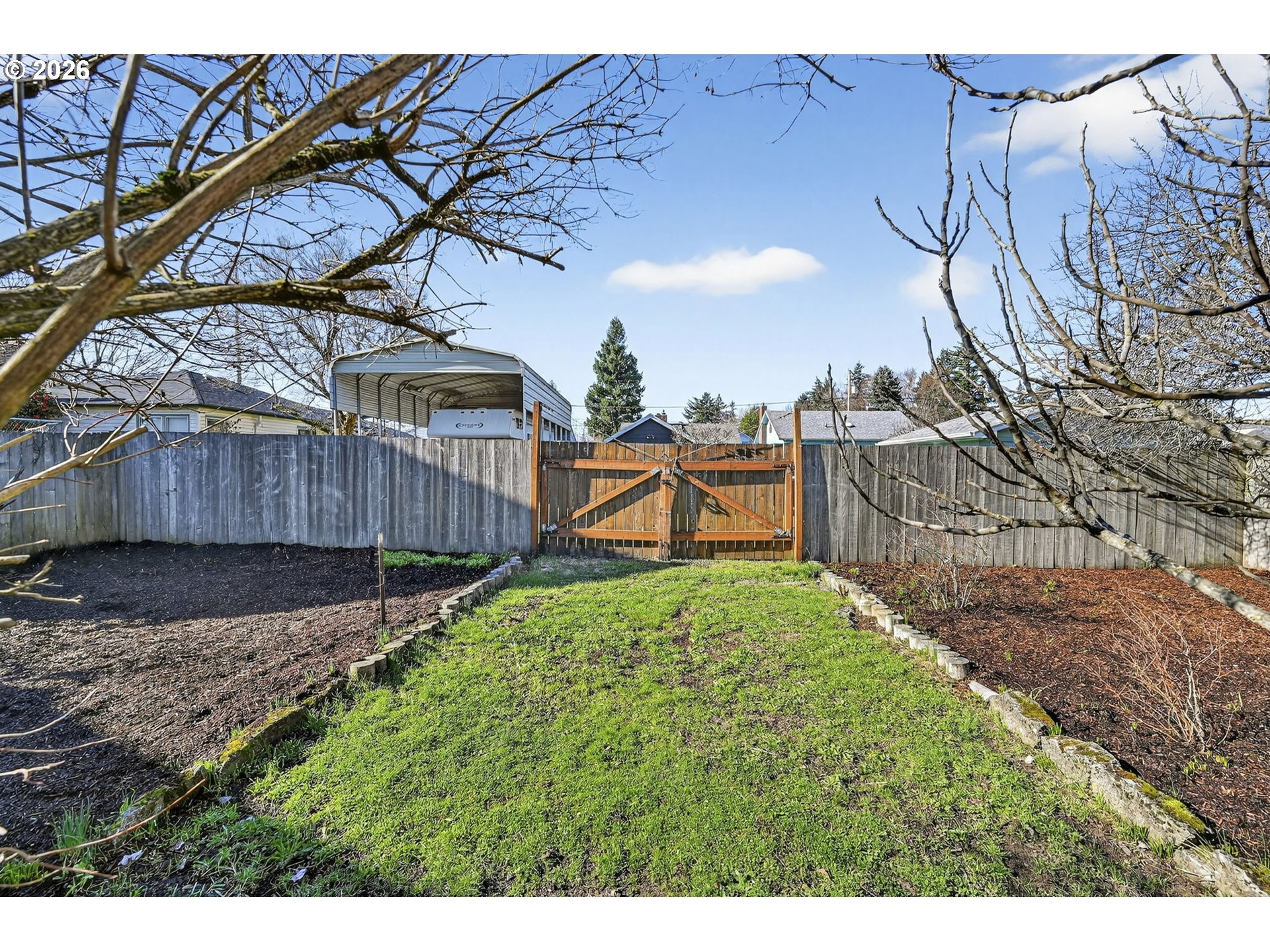 5617 Southeast 60th Avenue Portland, OR 97206 - Photo 32 of 34 a view of backyard with wooden fence