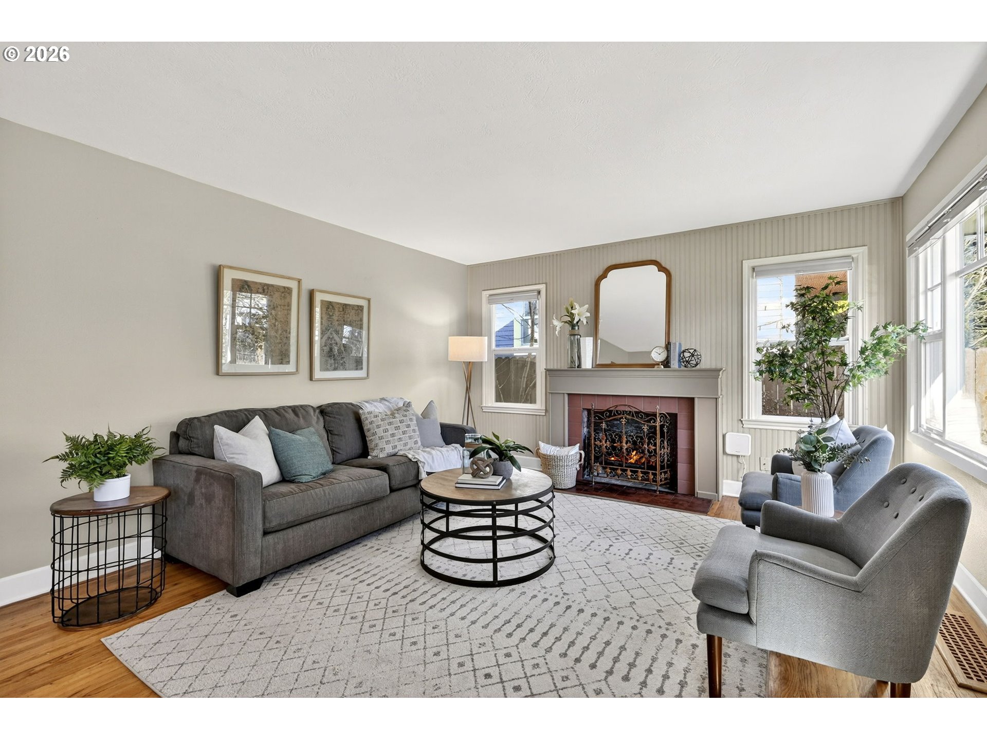 5617 Southeast 60th Avenue Portland, OR 97206 - Photo 4 of 34 a living room with furniture fireplace and window