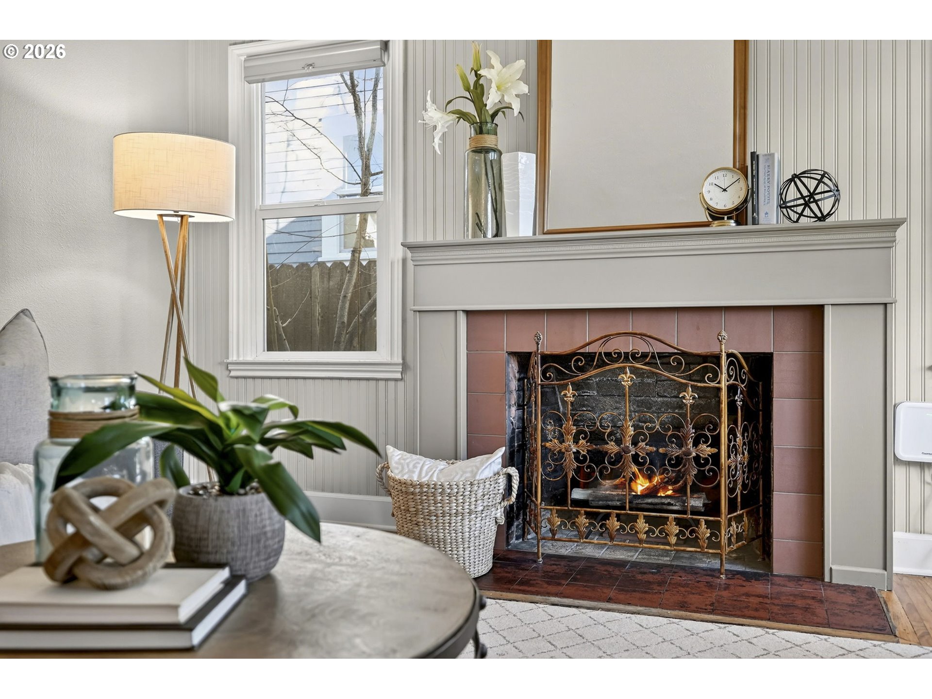 5617 Southeast 60th Avenue Portland, OR 97206 - Photo 6 of 34 a living room with furniture and a fireplace