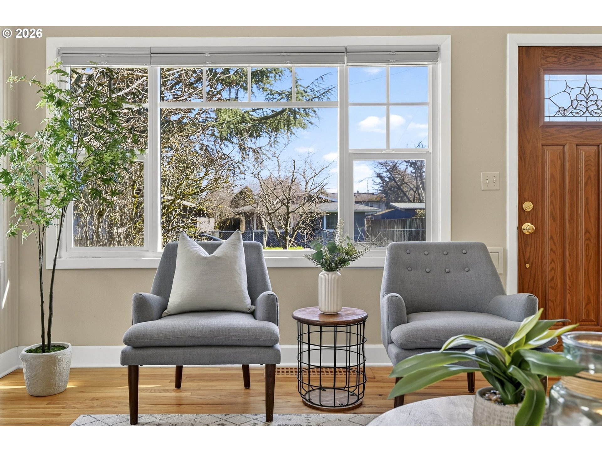 5617 Southeast 60th Avenue Portland, OR 97206 - Photo 9 of 34 a living room with furniture and a large window