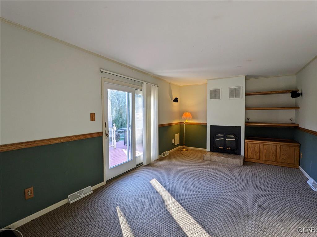 4422 Ammon Way Whitehall, PA 18052 - Photo 17 of 30 a view of an empty room with a fireplace