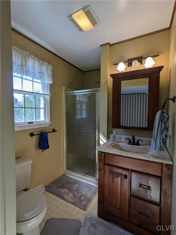 4422 Ammon Way Whitehall, PA 18052 - Photo 27 of 30 a bathroom with a sink a toilet and a mirror